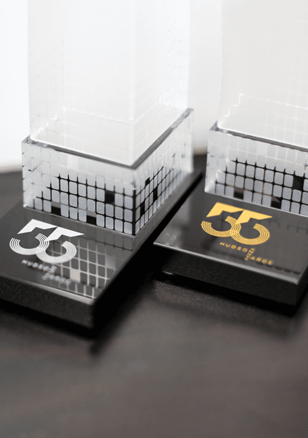 Crystal building replica with black crystal base