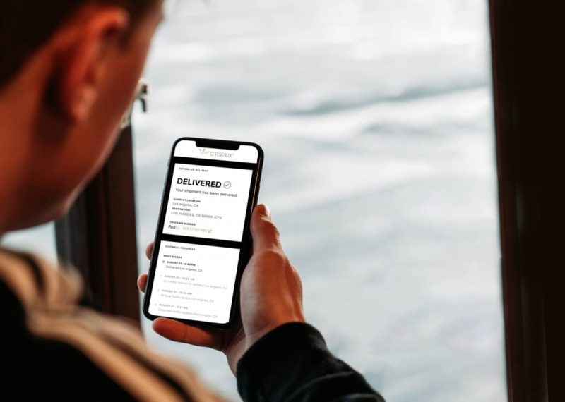 Man Holding IPhone Mockup